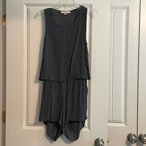 Loft black with white dot romper. Cut out in the back showing the lower back.
